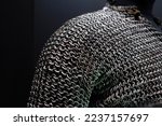 Close-up view of real handmade chainmail armor. Details of armor chain texture.