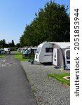 Small photo of Brecon, Powys,Wales,UK-7.27.2021: A view of rows of modern caravans on site at the Caravan and Motorhome Club Site known as Brecon Beacons, on the outskirts of Brecon.