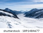 Amazing view of Aletsch Glacier, the largest glacier in the Alps, world heritage of Swiss and Bernese alps alpine snow mountains peaks, beautiful landscapes view downhill from the top of Jungfraujoch.