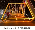 Small photo of Dubai, UAE - March 21, 2023: Exhibitor stand at Gitex Technology Week - the biggest in-person technology event in the world - with trade visitors from 110 countries.