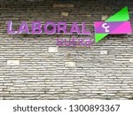 Small photo of MONDRAGON , GUIPUZCOA / SPAIN ; 01 31 2019 : LOGO OF LABORAL KUTXA COOPERATIVE OF CREDIT AND SAVINGS ON THE WALL IN THE ROAD OF THE CENTRAL HEADQUARTERS