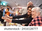 Small photo of Amherst, N.H., USA -- Jan. 19, 2024: Former U.N. Ambassador Nikki Haley poses for a selfie with voters at MaryAnn's Diner.