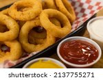 Small photo of onion rings junk food fast food greasy side dish tasty epicurean snack