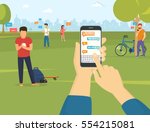 human hand holds smart phone... | Shutterstock .eps vector #554215081