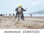 Small photo of Pangandaran, Central Java, May 22, 2023. Drag race on a unique and unusual harley davidson motorbike on the beach at the 50th HDCI event