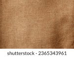 top view and flat lay a burlap hessian sacking or textured burlap burlap,brown sackcloth texture.light natural linen texture for background
 and empty space
For designing or advertising webs