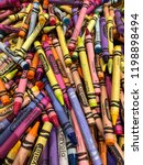 Small photo of Plano, Texas/United States - March 29, 2018: Pile of Crayola crayons at Crayola Experience. These crayons are used to color pages at coloring stations.