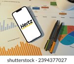 Small photo of Munich, Bavaria, Germany - March 31 2023: Hertz is a global leader in car rental services, offering a wide array of vehicles for any journey. It promises efficiency and quality
