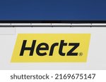 Small photo of Villefranche sur Saone, France - May 17, 2020: Hertz logo on a truck. Hertz is an American car rental company with international locations in 145 countries worldwide