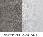 Rough textured surface with exposed aggregate finish, floor stone washed wall, made of small sandstone mix, grooved line decoration. Can be used as background or texture
