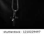 hands of human praying on black ... | Shutterstock . vector #1210229497