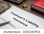 Employers liability insurance application form on the table.
