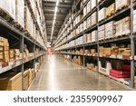 Nonthaburi, Thailand, June 17, 2023: Large warehouse corridors, warehouse storage and distribution of goods and goods on the shelf. IKEA is a furniture retailer that sells ready-to-assemble furniture.