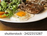
meat steak egg soft-boiled salad food