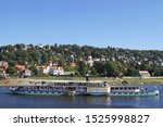 Small photo of Dresden, Germany - September 22 2019: The paddle steamer 'Meissen' of the Sachsische Dampfschiffahrt on the river Elbe. Dresden has the oldest and largest paddle steamer fleet in the world.