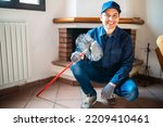 Young chimney sweep portrait in a house