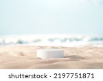 Summer tropical background, Podium on sand beach on sea background, Mock up for the exhibitions, Presentation of products, 3d render.