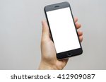 Close up hand holding black phone on white clipping path inside.