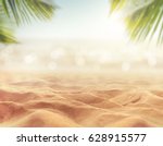 Sand With Blurred Palm And...