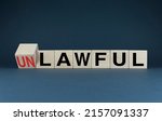 Small photo of Unlawful or Lawful. Cubes form the choice words Unlawful or Lawful. The concept of the definition of legality in any field of activity