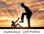 Small photo of Selfishness. The big man with the crown on his head intends to destroy the little man. The concept of behavior as a selfish tyrant and dictator in business, politics and life. Silhouette