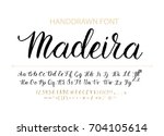 handwritten script font. hand... | Shutterstock .eps vector #704105614