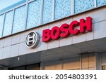 Small photo of Moscow, Russia - 08 October 2021: Exterior view of Bosh sign on building facade.