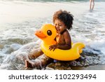 Cute Toddler With Duck Tube On...