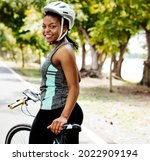 Cyclist Woman Riding A Bike