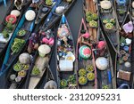 Small photo of Martapura, Indonesia June 1, 2023. Transactions carried out by floating market traders, usually can be by barter or with money.