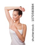 Small photo of Beautiful young woman with armpit odor problem. Armpit epilation, lacer hair removal. smooth armpit