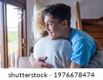 Loving teenager smiling enjoy moment strong cuddles adult mom after long separation, mother glad to see son multi generational family reunion, love and bonding concept