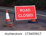 Road sign in the UK indicating that the road ahead is closed.
