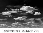 Small photo of Real clouds and sky hi-res texture for design and retouch - abstract photo texture of the real clouds on the black background for adding and editing as a background layer in the Screen blending mode