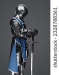 Medieval guard dressed in armor ...