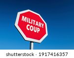 Small photo of Stop sign with MILITARY COUP text to cease army putsch in a country