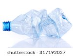 Crushed plastic bottle, isolated on white