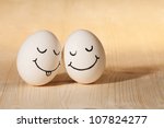 Two Eggs With Drawn Smiley Faces
