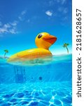 Small photo of Inflatable duck swim in the pool water on tropical resort half underwater split shot