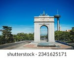 Faro de Moncloa transmission tower and Arc of Victory or Arco Victoria, triumphal arch in Madrid, Spain view from above