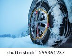 Wheel with ice chains for tire on a snowy road