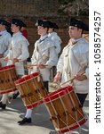 Small photo of Williamsburg, Virgina - March 26, 2018: Reenactment marching band Fife and drum at Colonial WIlliamsburg.