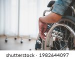 Small photo of Physically handicapped patients in a wheelchair waiting to be admitted to the hospital to check for physical abnormalities and guidelines for treatment.