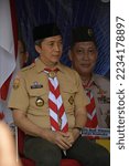 Small photo of Bogor - Indonesia June 7 2022, deputy mayor of Bogor, Dedie A Rachim, gave a speech at the World Environment Day event which was held at the Katulampa Dam, Bogor, together with scout members