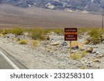 Sign Caution - Extreme Heat - Danger - indicates extreme heat and danger to life, Death Valley National Park, California, USA