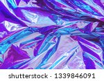 Abstract Modern bright colored holographic background in 80s style. Synthwave. Vaporwave style. Retrowave, retro futurism, webpunk