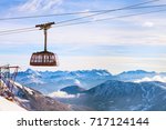 Cable Car And Snow Mountains...