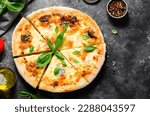 Four Cheese Pizza on Dark Background, Freshly Baked Pizza and Basil Leaves