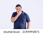 Small photo of A frustrated man cringes reacting to a deplorable mistake. Outed in a controversial scandal. Isolated on a white background.