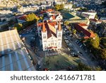 Small photo of Baguio City, Philippines - Jan 16, 2024: Aerial of Our Lady of the Atonement Cathedral or Baguio Cathedral and the surrounding cityscape.